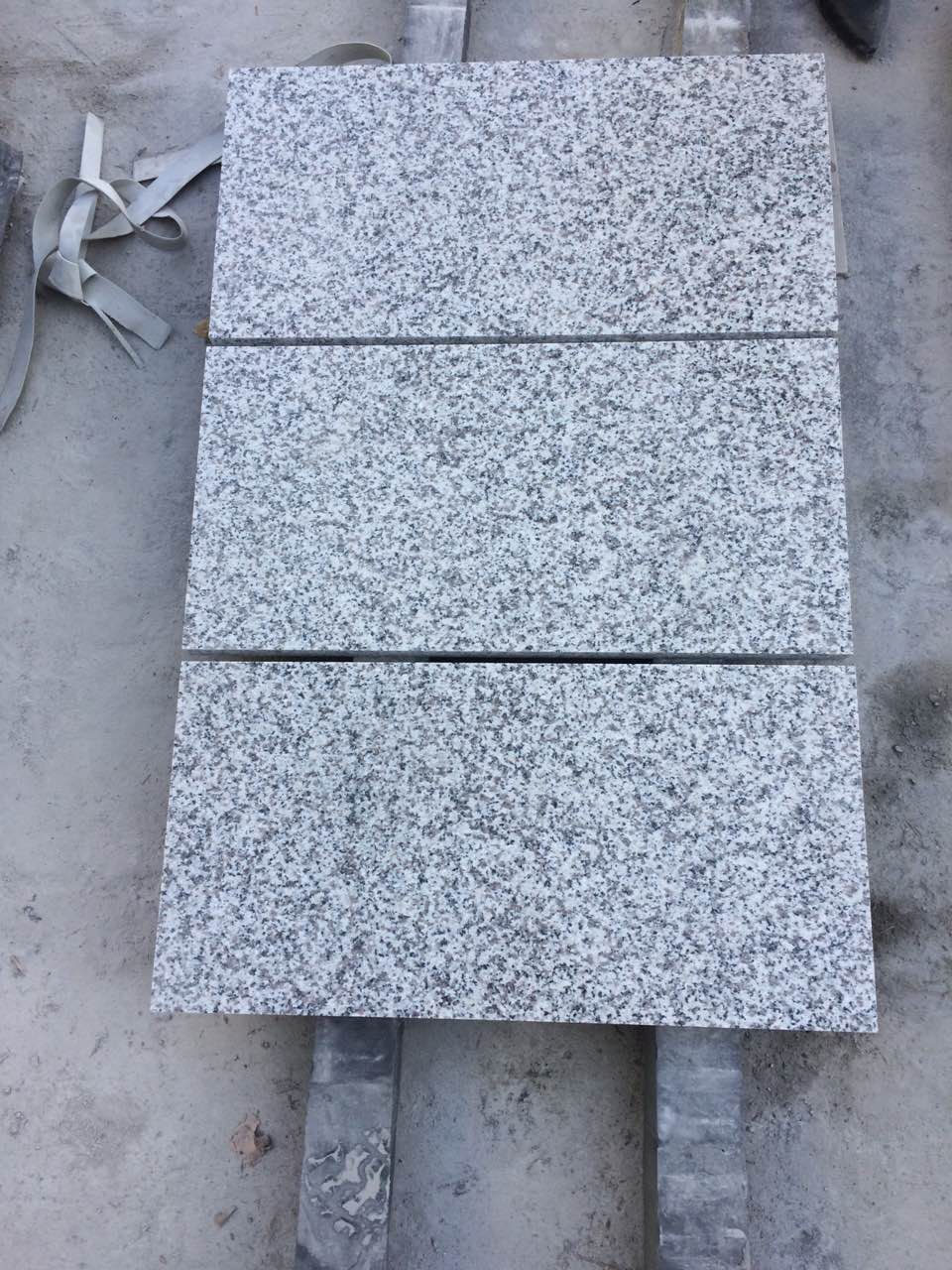 light grey G623 tiles