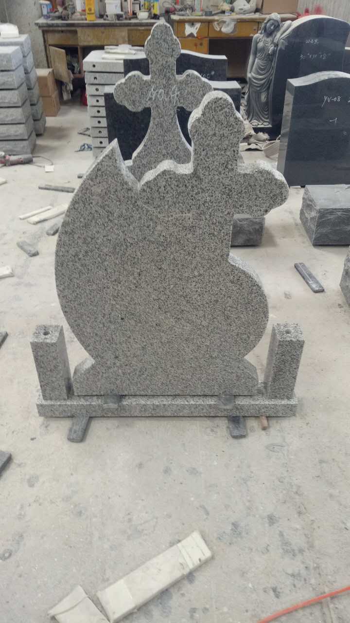 light grey G603 headstone