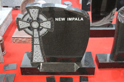 Impala Grey HeadstoneTombstone with Cross Flower Sculpture
