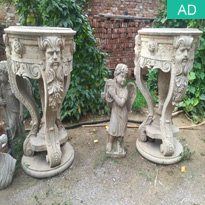 Antiqued stone garden flowerpots
